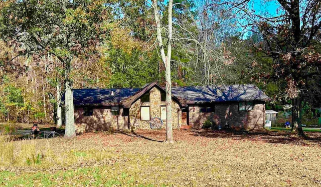 view of front of home with a front yard