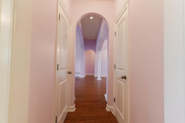 hall with dark wood-type flooring