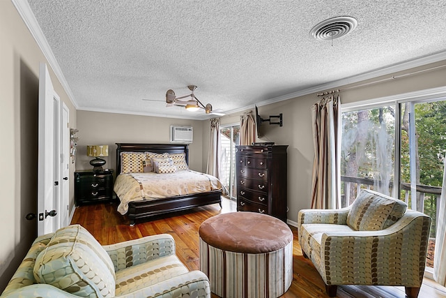 bedroom featuring hardwood / wood-style flooring, multiple windows, and ornamental molding