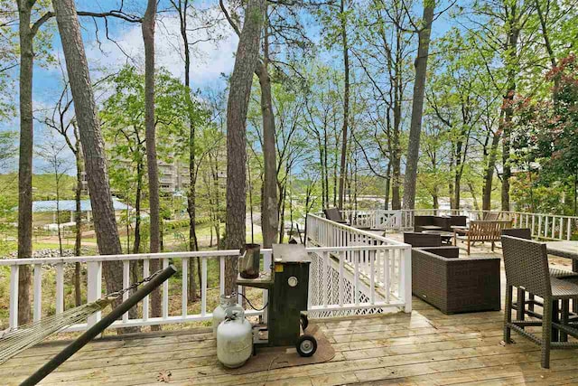 deck featuring a water view