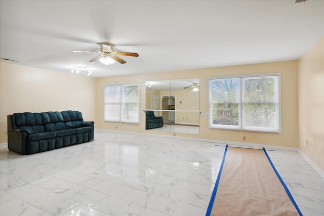 living room with ceiling fan