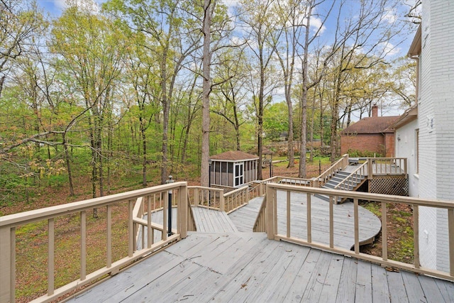 wooden terrace with a sunroom