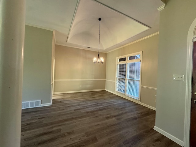 unfurnished dining area featuring crown molding, dark hardwood / wood-style flooring, and an inviting chandelier