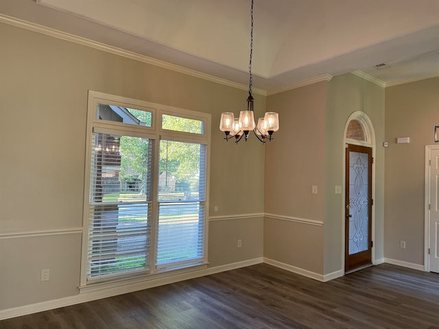 unfurnished dining area with ornamental molding, dark wood-type flooring, and a chandelier