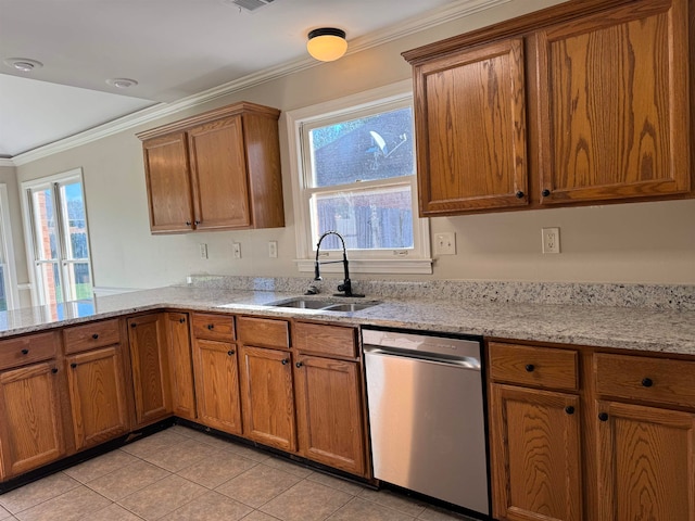 kitchen with ornamental molding, stainless steel dishwasher, a healthy amount of sunlight, and sink