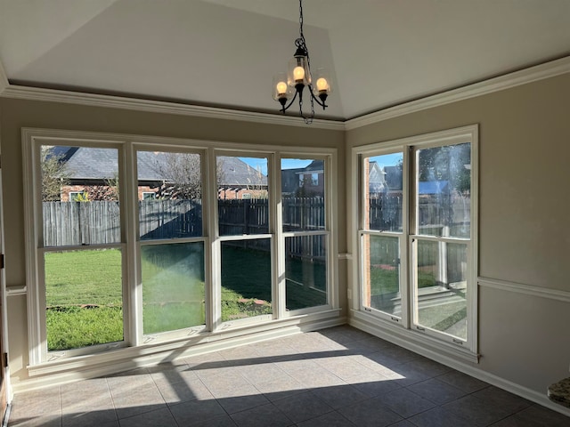 unfurnished sunroom featuring a chandelier and vaulted ceiling