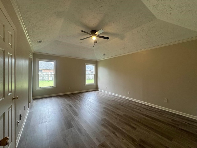 unfurnished room featuring crown molding, dark hardwood / wood-style flooring, and a textured ceiling