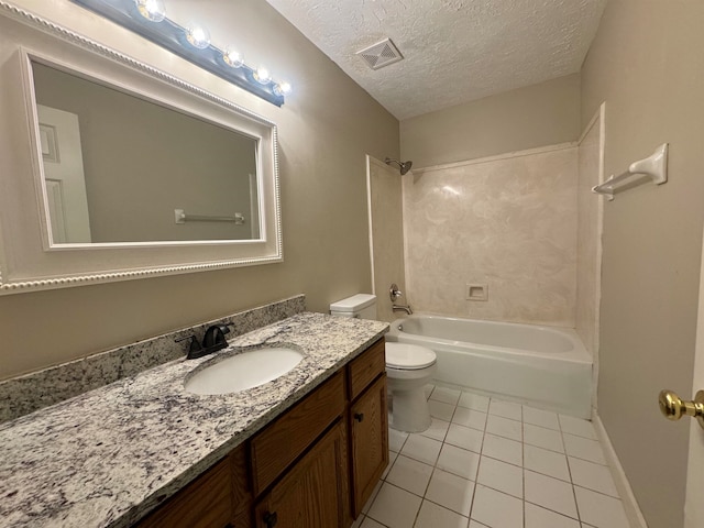 full bathroom featuring tile patterned floors, a textured ceiling, toilet, shower / washtub combination, and vanity