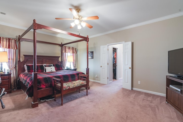 bedroom with light colored carpet, ceiling fan, and crown molding