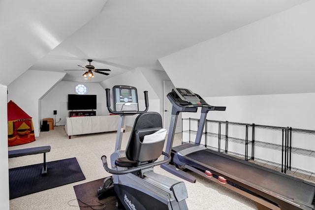 exercise room with lofted ceiling, carpet floors, and ceiling fan