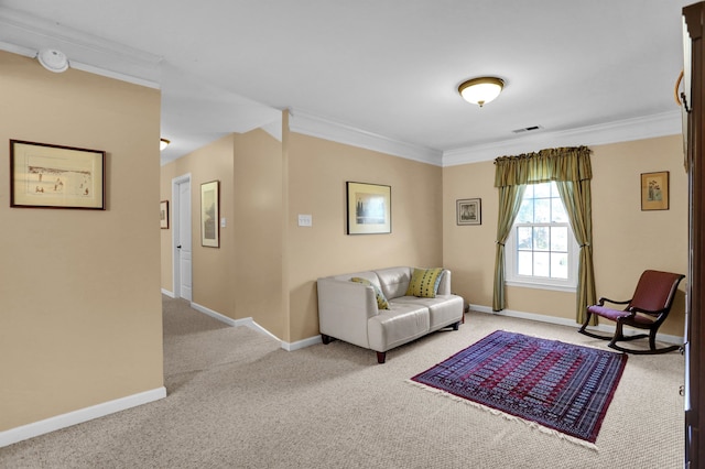 carpeted living room featuring ornamental molding