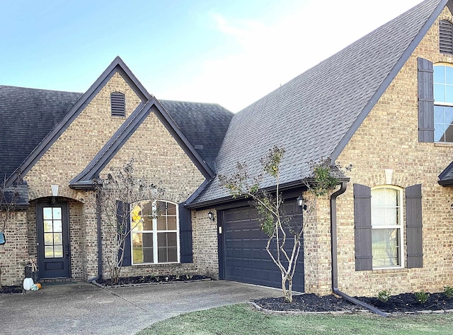 view of front of property with a garage