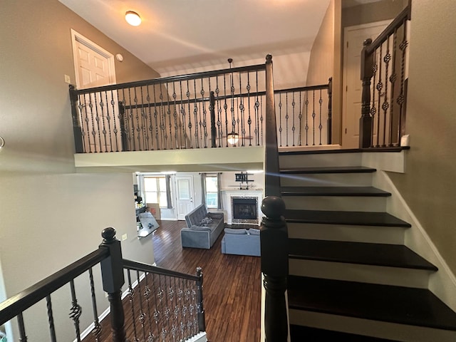 stairway featuring hardwood / wood-style floors