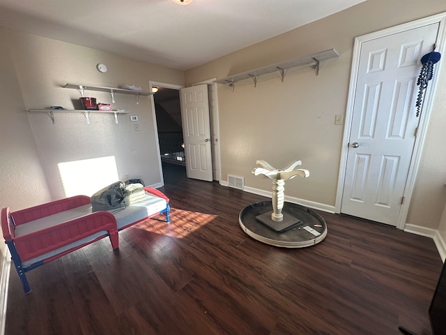 living area with dark wood-type flooring