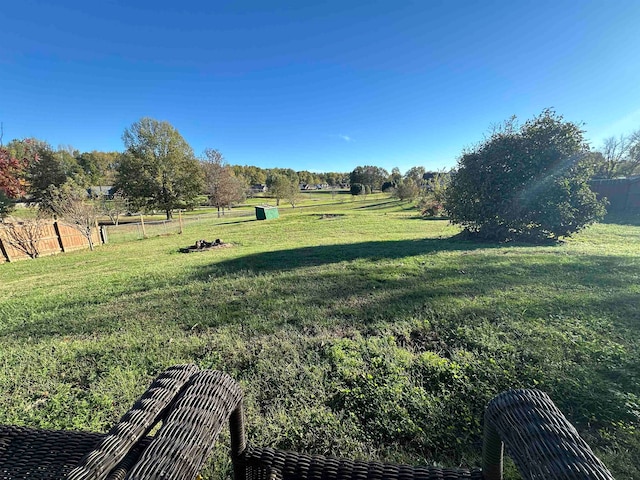 view of yard with a rural view