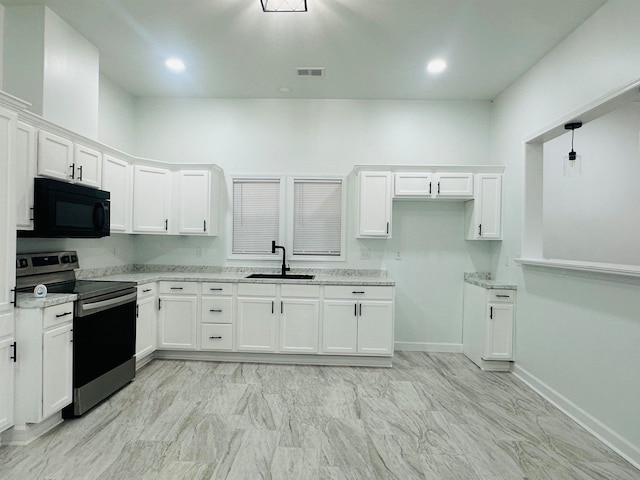 kitchen featuring sink, white cabinetry, stainless steel range with electric cooktop, and hanging light fixtures