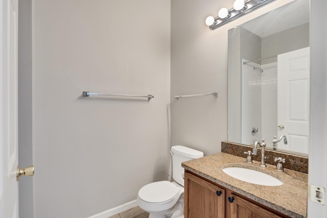 bathroom with toilet, a shower, vanity, and tile patterned flooring