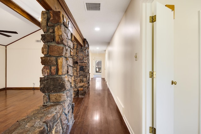 hall featuring dark wood-type flooring