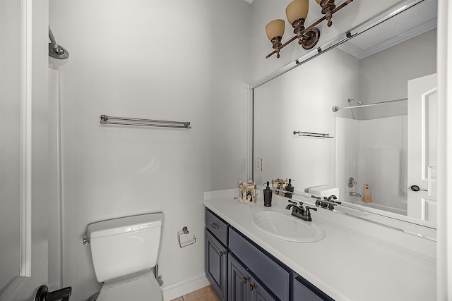 bathroom featuring walk in shower, vanity, and toilet