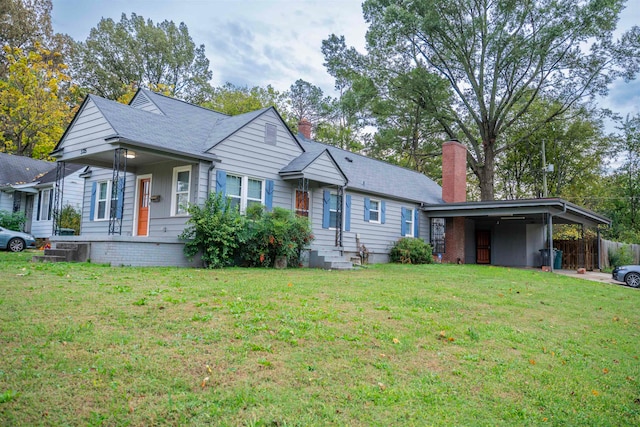 view of front of property featuring a carport and a front lawn