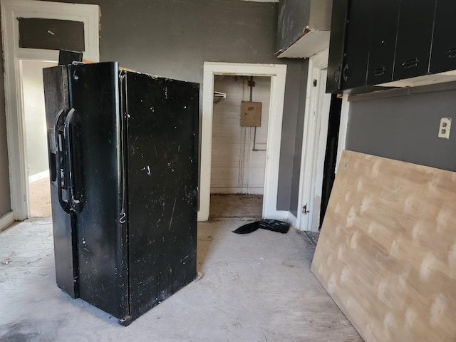 kitchen featuring black fridge with ice dispenser