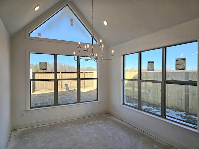 12064 Stromness Cv, Arlington, TN 38002 - empty room with lofted ceiling, baseboards, a chandelier, unfinished concrete flooring, and recessed lighting