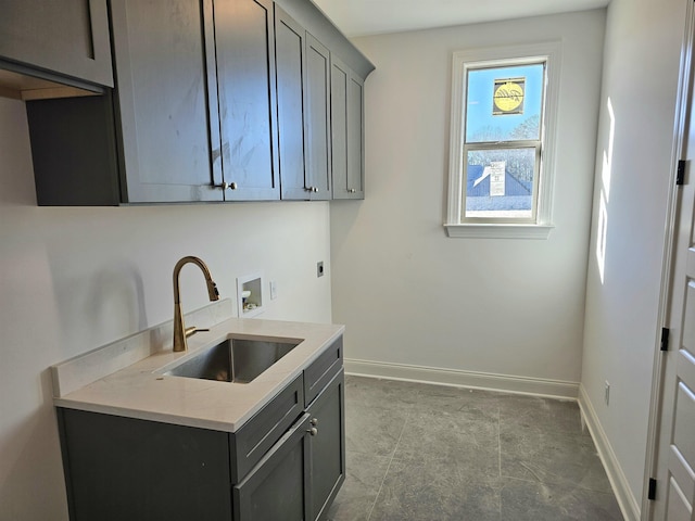 12064 Stromness Cv, Arlington, TN 38002 - laundry area featuring washer hookup, hookup for an electric dryer, cabinet space, and baseboards