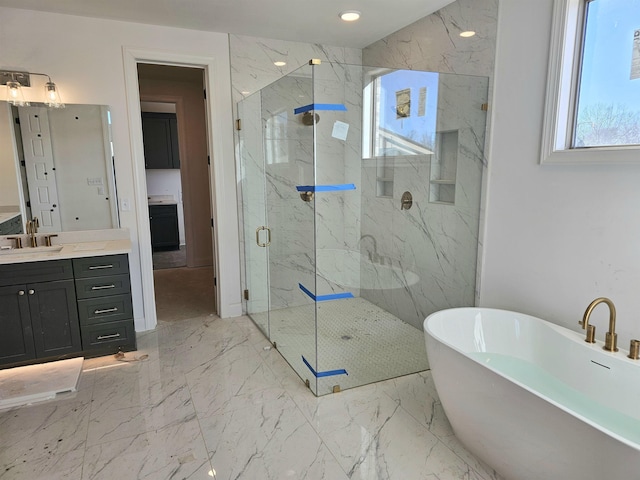 12064 Stromness Cv, Arlington, TN 38002 - full bathroom with a freestanding tub, a marble finish shower, vanity, and marble finish flooring