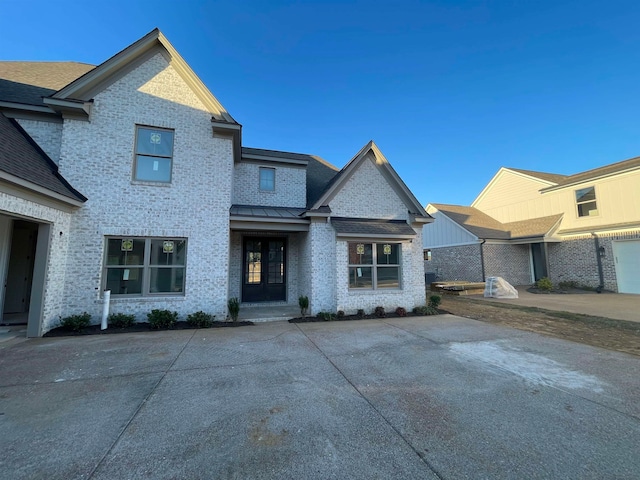 view of front of house with a patio area