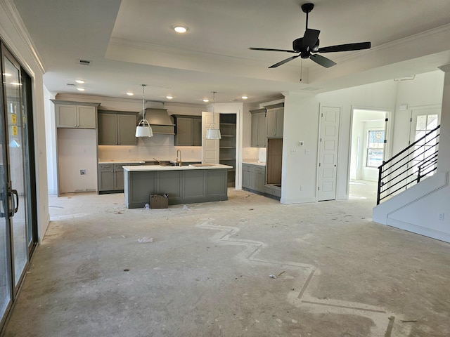 12064 Stromness Cv, Arlington, TN 38002 - unfurnished living room with ornamental molding, ceiling fan, stairway, recessed lighting, and a sink