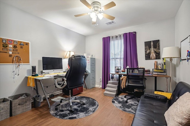 home office with ceiling fan and wood-type flooring