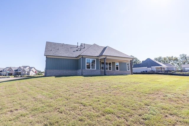 exterior space with a front lawn