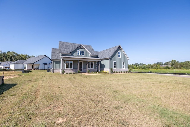 craftsman inspired home with a front yard