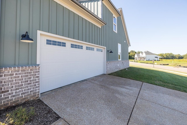 garage with a lawn