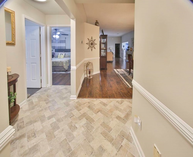 corridor featuring light hardwood / wood-style flooring