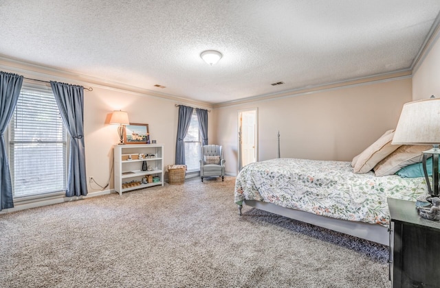 bedroom featuring multiple windows, a textured ceiling, and ornamental molding