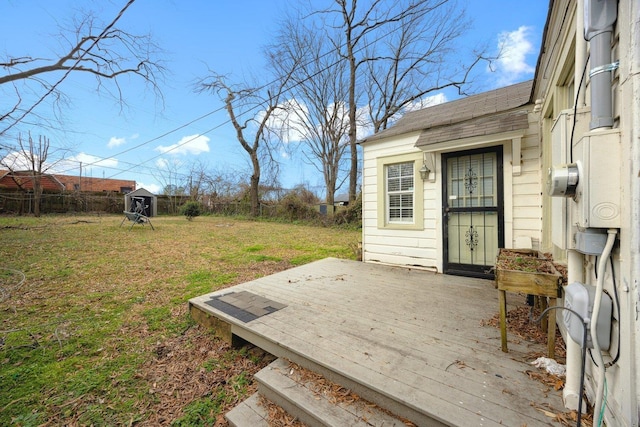 wooden deck with a yard