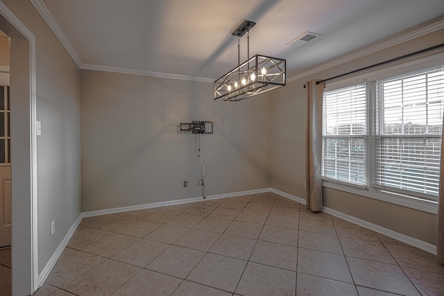 tiled spare room featuring an inviting chandelier and ornamental molding