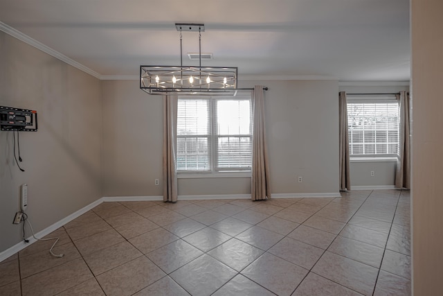 tiled empty room with plenty of natural light, crown molding, and a notable chandelier