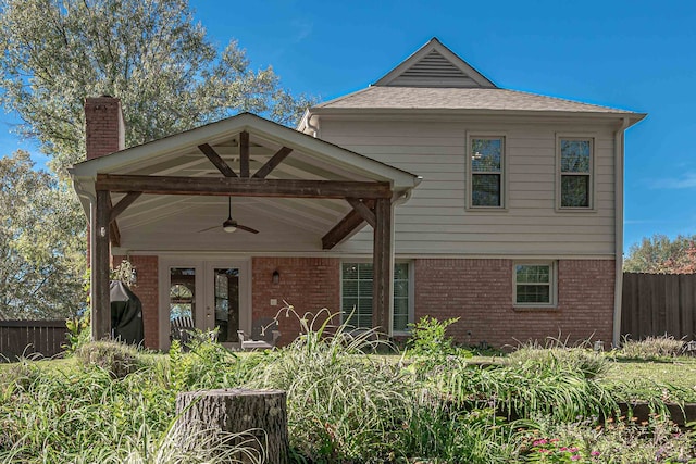 view of front of house featuring ceiling fan and french doors