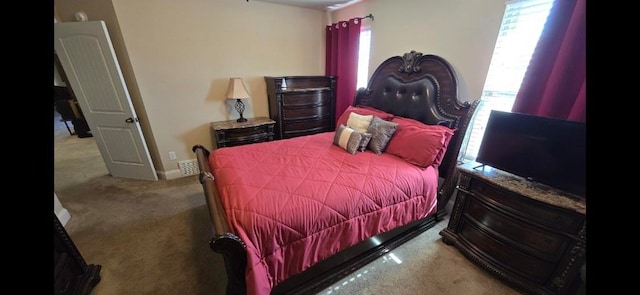 bedroom featuring carpet