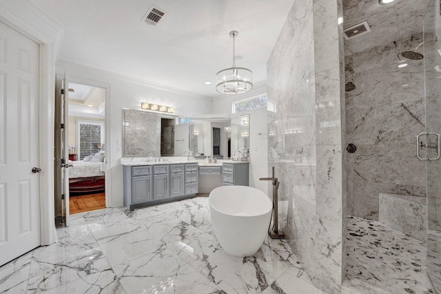 bathroom featuring a chandelier, vanity, independent shower and bath, and ornamental molding