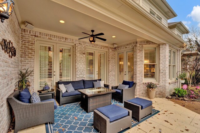 view of patio featuring an outdoor living space and ceiling fan