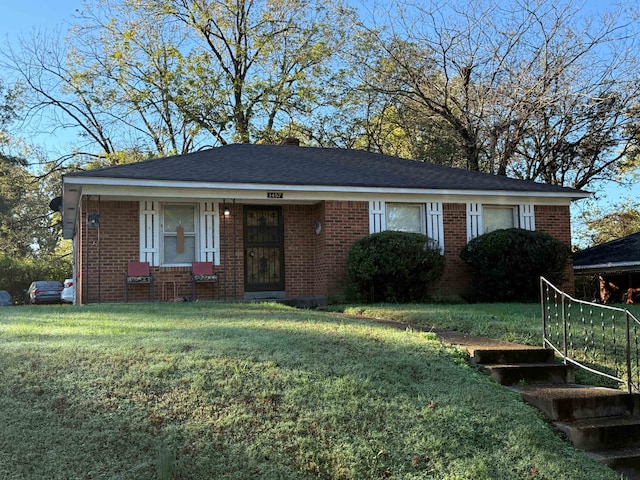 view of front of property with a front yard