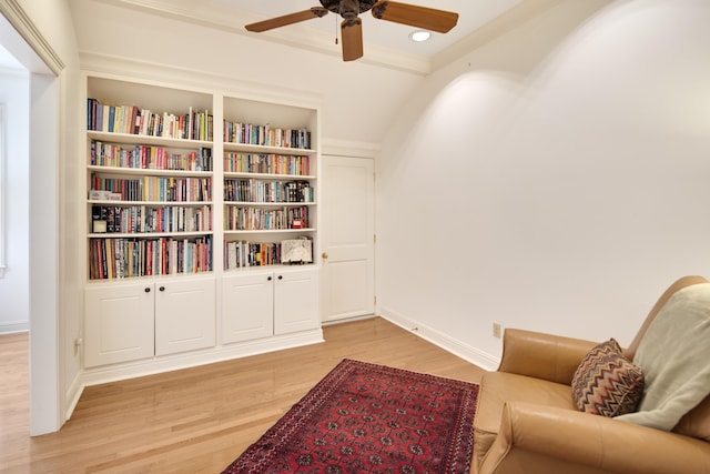 sitting room featuring ceiling fan and light hardwood / wood-style floors