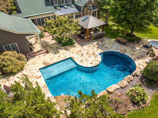 view of swimming pool with a gazebo and a patio