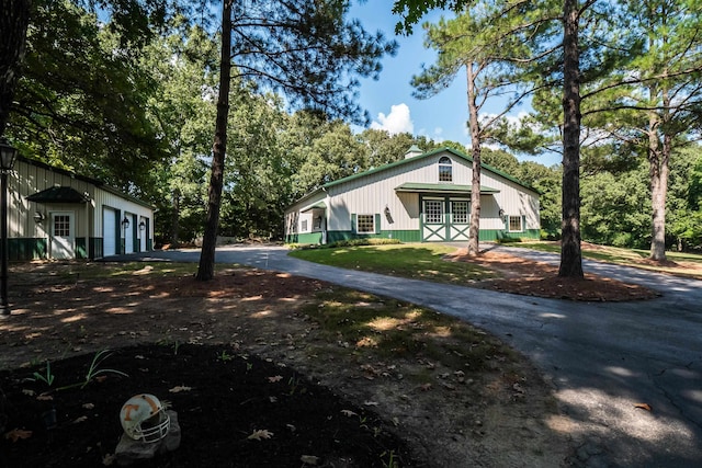 view of side of home with a garage