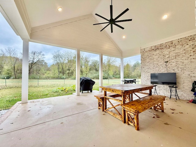 view of patio with a grill and ceiling fan