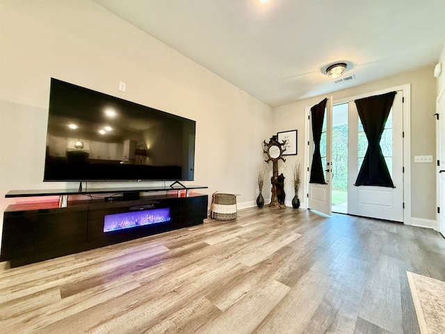 foyer entrance featuring light hardwood / wood-style flooring