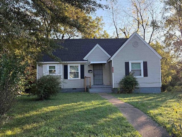 view of front of property with a front lawn